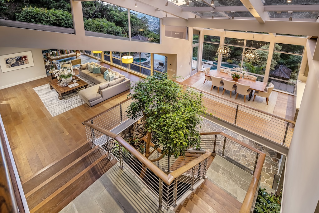 Soaring ceilings and architectural details bring light and harmony to this multi-level layout.