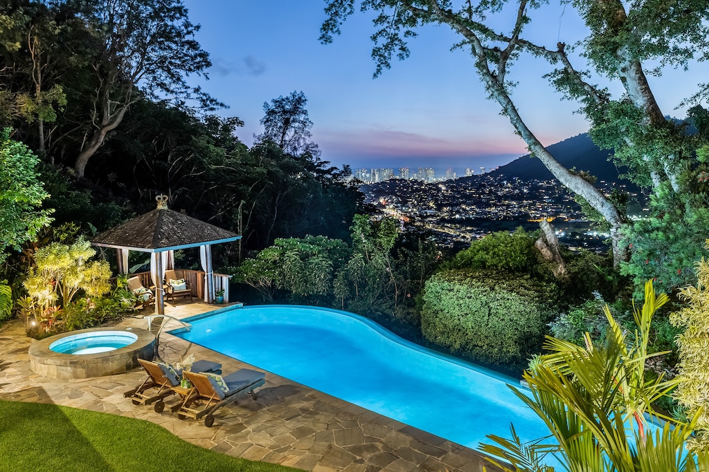 Swim above the city in this serene infinity pool with breathtaking views of Honolulu and beyond.