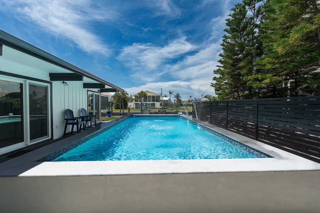 Enjoy the heated pool while you enjoy the bay views.