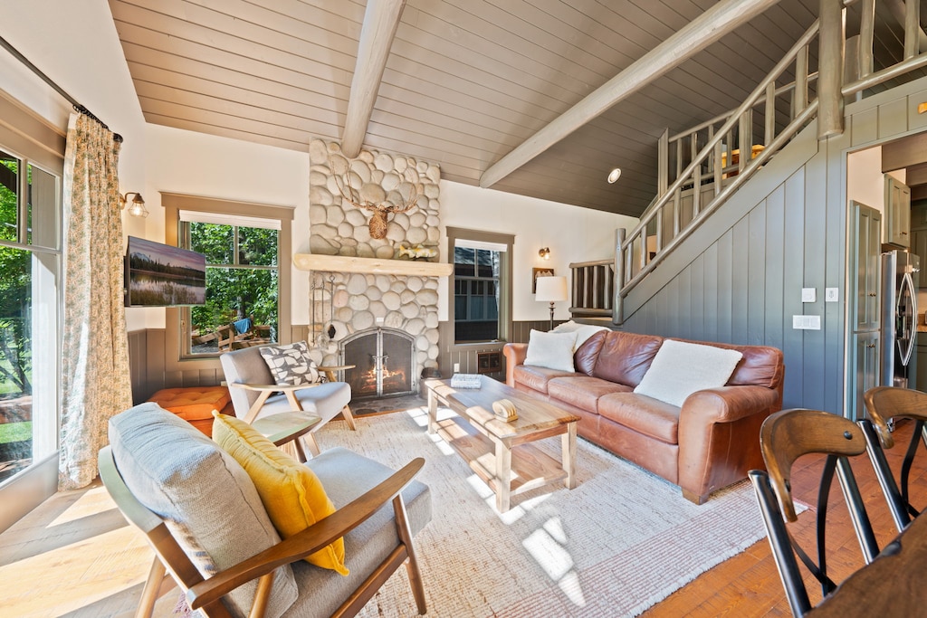 Living Space full of natural light and view of the river