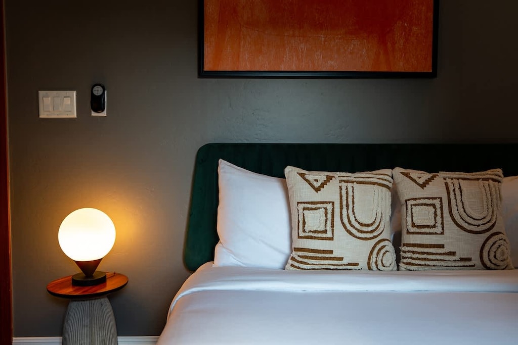 Nights of bliss, mornings of joy: Our bedroom's comfortable bed and soft linens set the stage for peaceful slumber and waking up feeling revitalized. Step into a world of rest and rejuvenation.