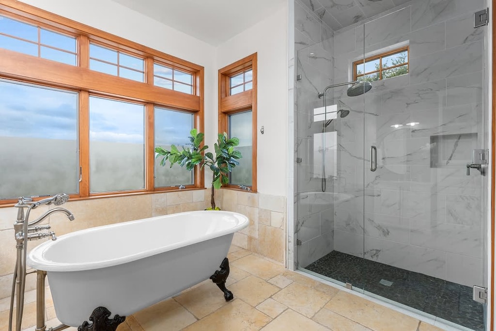 Your personal retreat: Unwind in style in our spa-like bathroom, complete with a double vanity, a deep soaking tub, and a revitalizing walk-in shower. Recharge your senses and transform daily routines into blissful rituals.