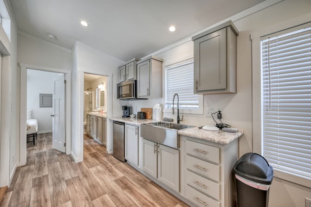 Kitchenette w/Sink, Microwave, Coffee Pot, and Mini Fridge