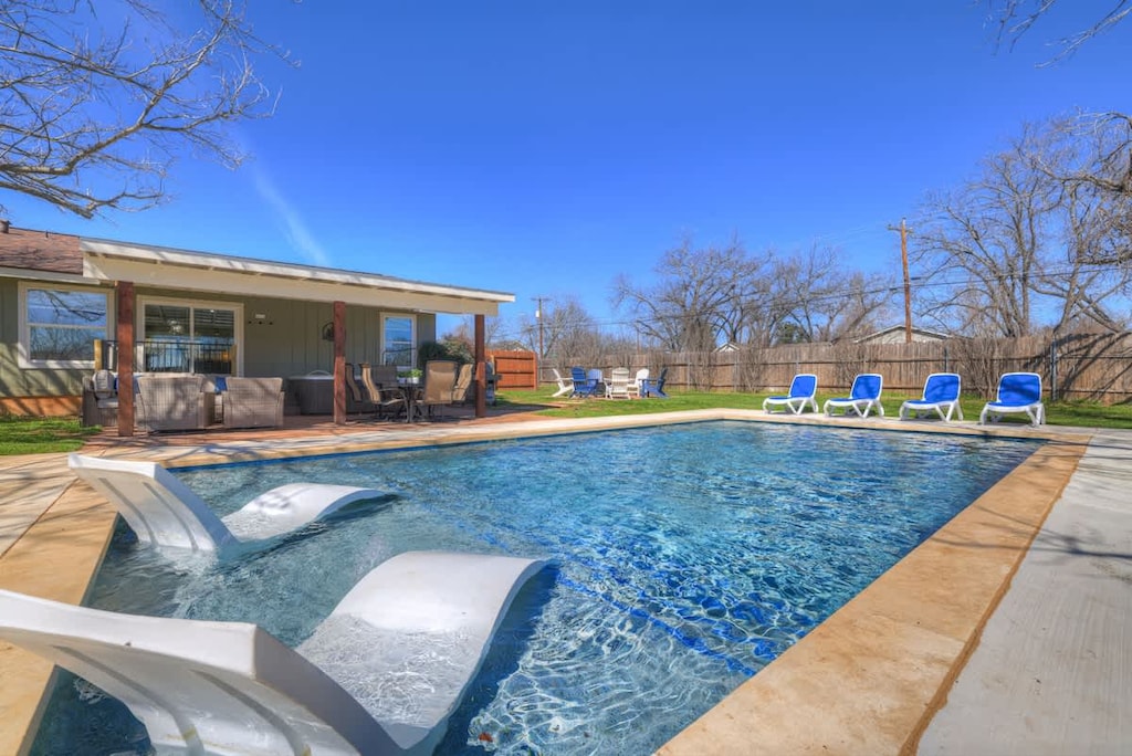 Enjoy the cool waters in this gorgeous pool on a sunny day.