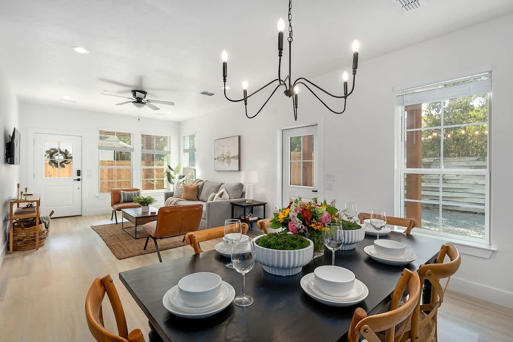 Keep the convo going with the whole group in the open concept dining and living space.