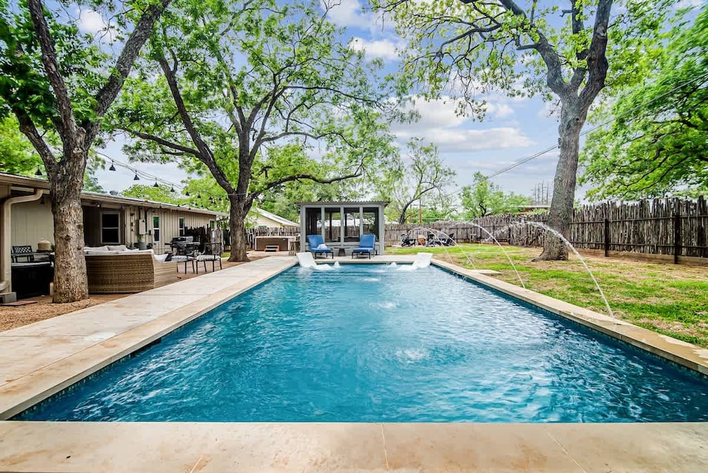 The sparkling pool is the perfect spot to cool off on a hot summer day! 