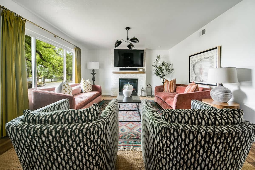 Natural light fills the living room, creating a warm and inviting ambiance—an ideal space to gather with friends and family.