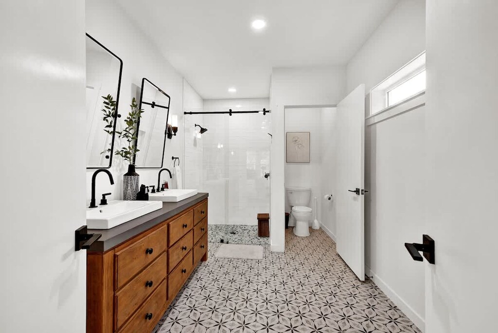 Bathroom 1 En-Suite with double vanity and spacious walk in shower 