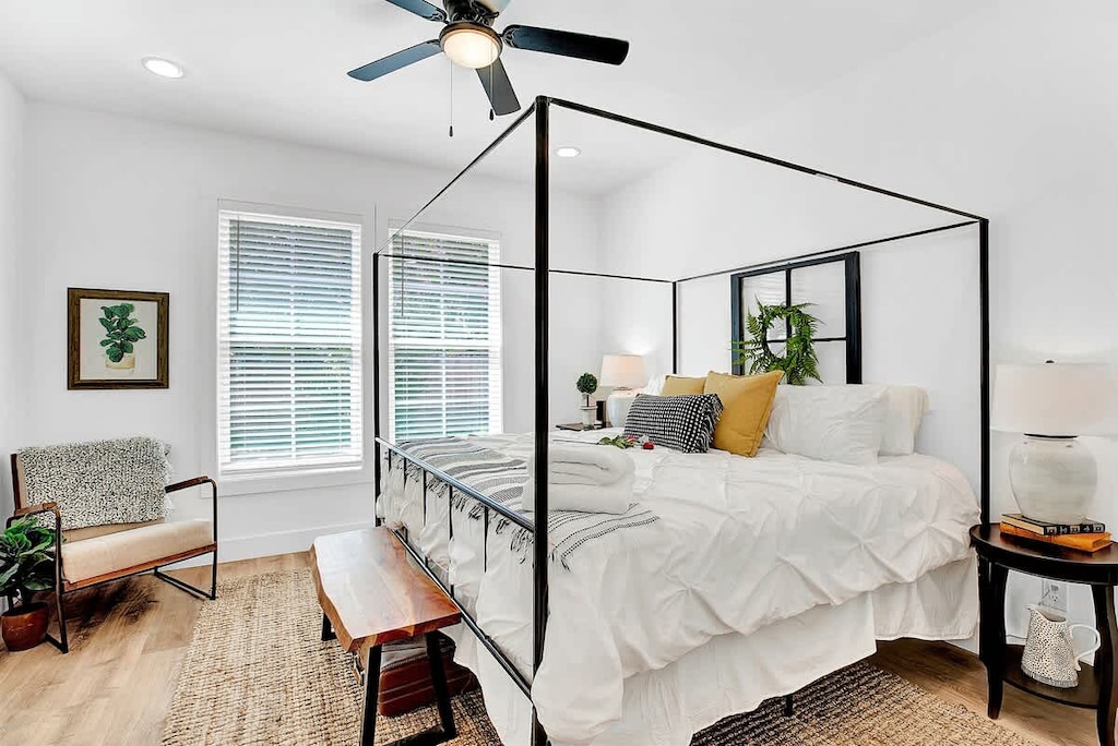 Unwind in the beautiful master bedroom.