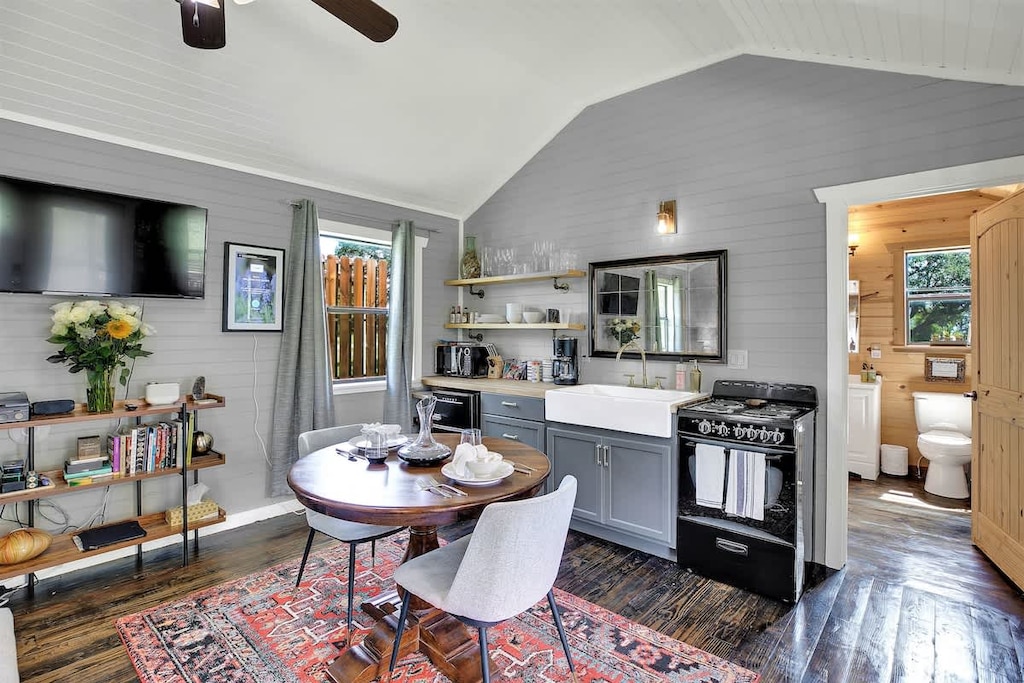 This charming cabin boasts a fully-equipped kitchen and an intimate dining space for two, creating the perfect setting for culinary adventures and shared meals.