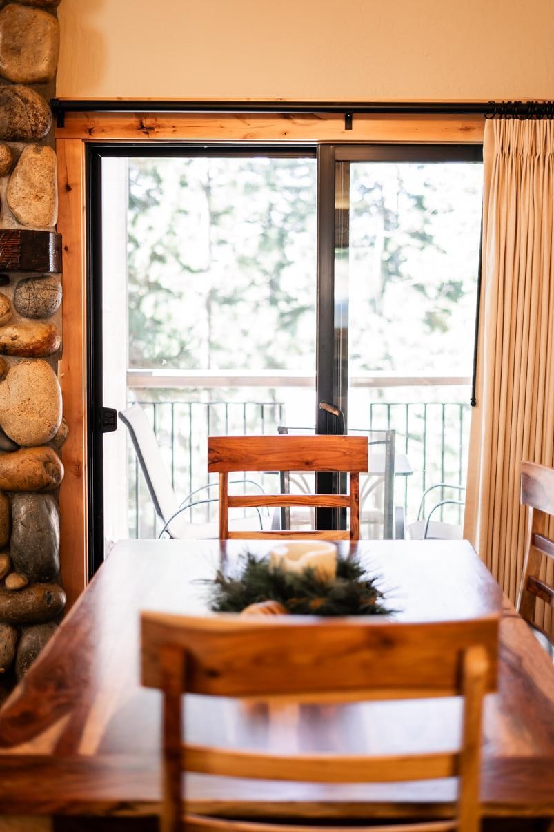 Enjoy mealtime at the dining room table with stunning views of the mountain trees—where every meal feels like a getaway