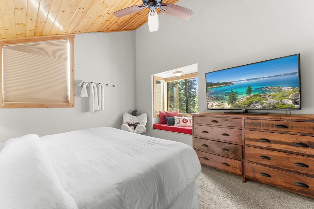 Escape to our spacious primary bedroom featuring a king bed, ensuite bathroom, and a cozy nook with stunning views of the Northstar landscape!
