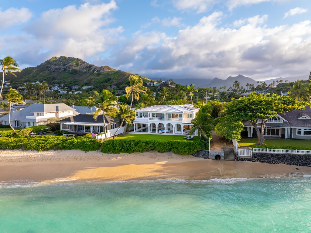 Aerial of Lanikai Sunrise nestled along the golden sands of the Mokulua coast.