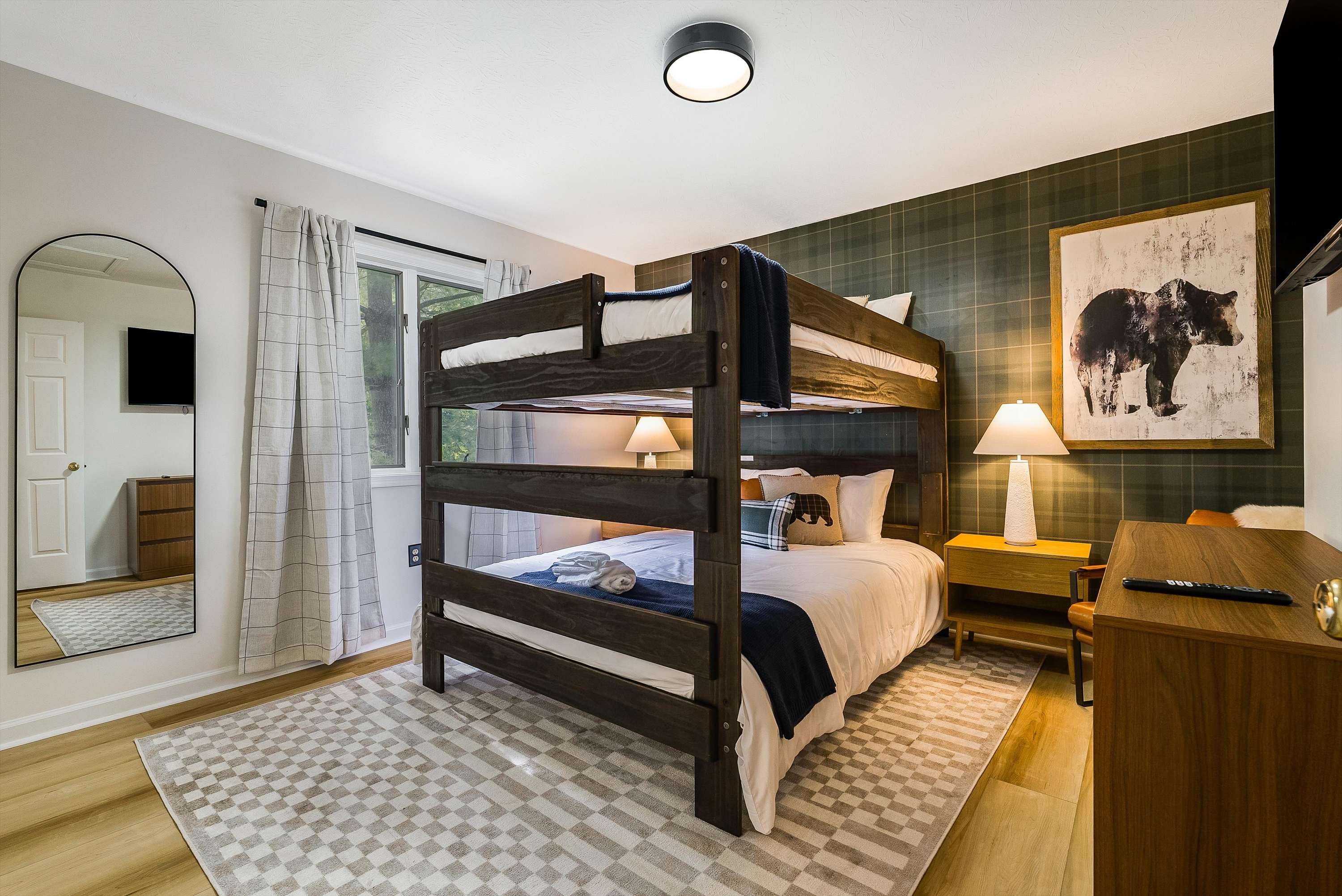Bedroom 1: Queen Over Queen Bunk - The best kind of sleepover. This bunk room is a kid-friendly dream and an adult-approved getaway for the young at heart.