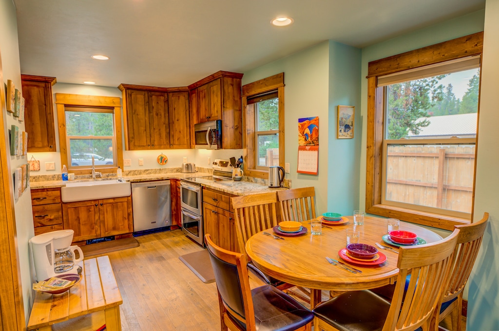 A view of the dining room leading into the kitchen