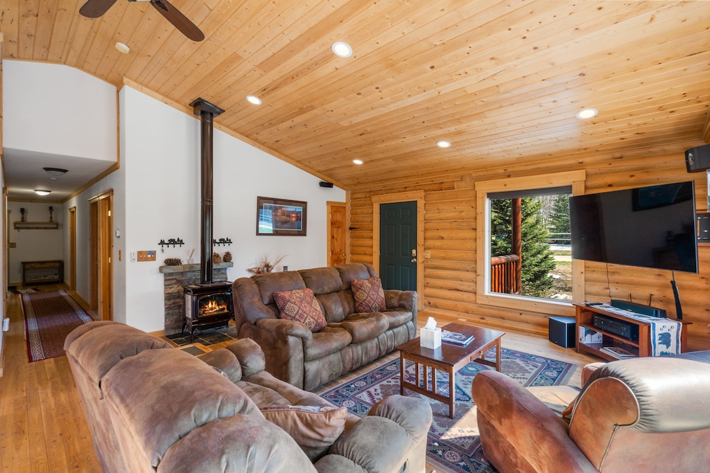 Living room looking towards front door and hallway to bedrooms.