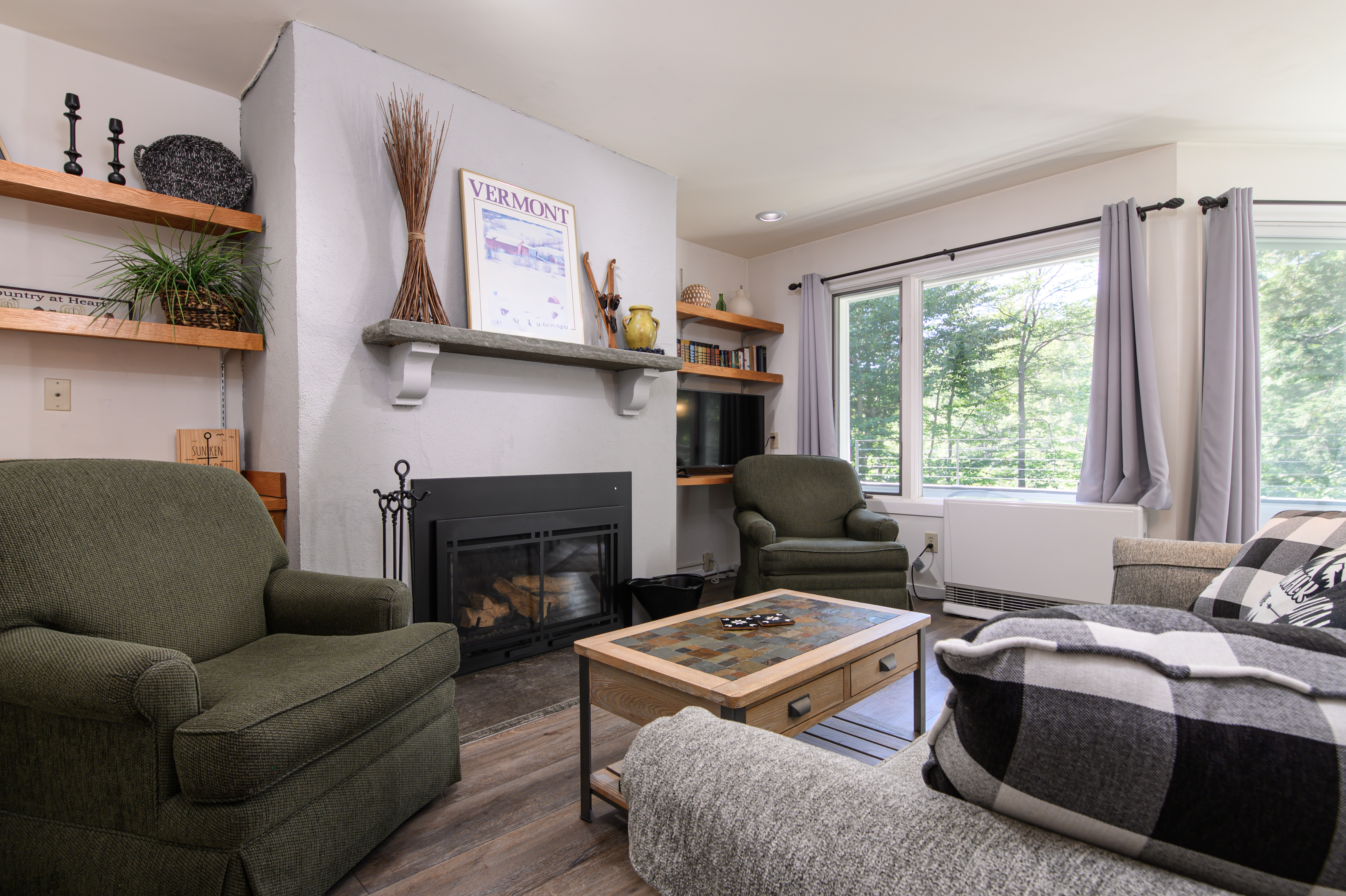 Inviting living room featuring a gas fireplace and plenty of seating