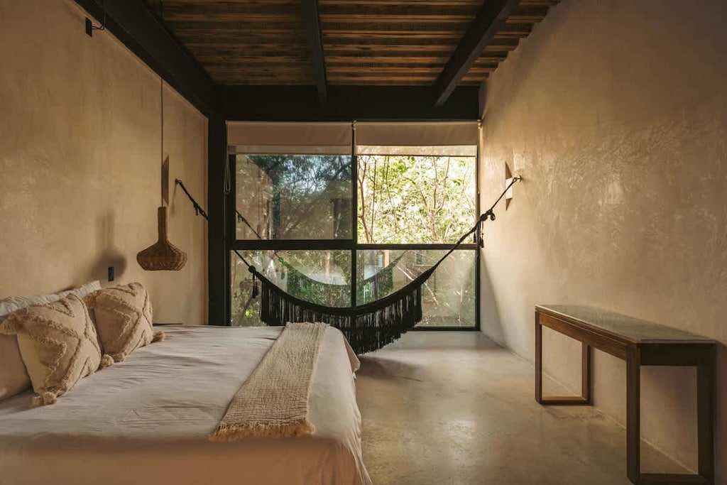 Spacious and bright second-floor bedroom.
