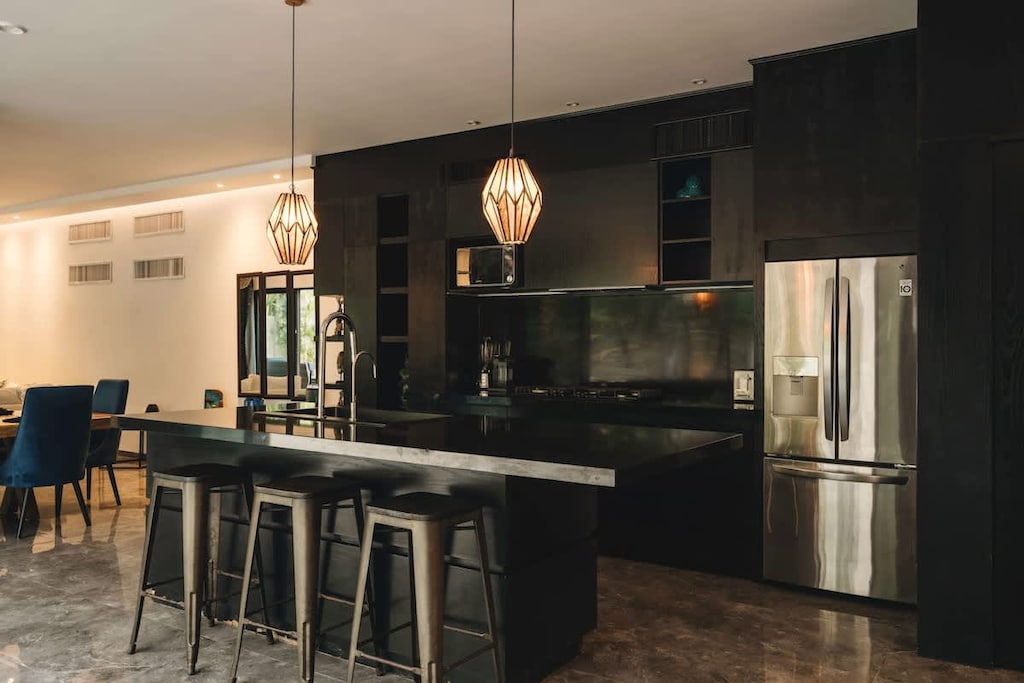 Modern kitchen, fully equipped. Features a fantastic breakfast bar.