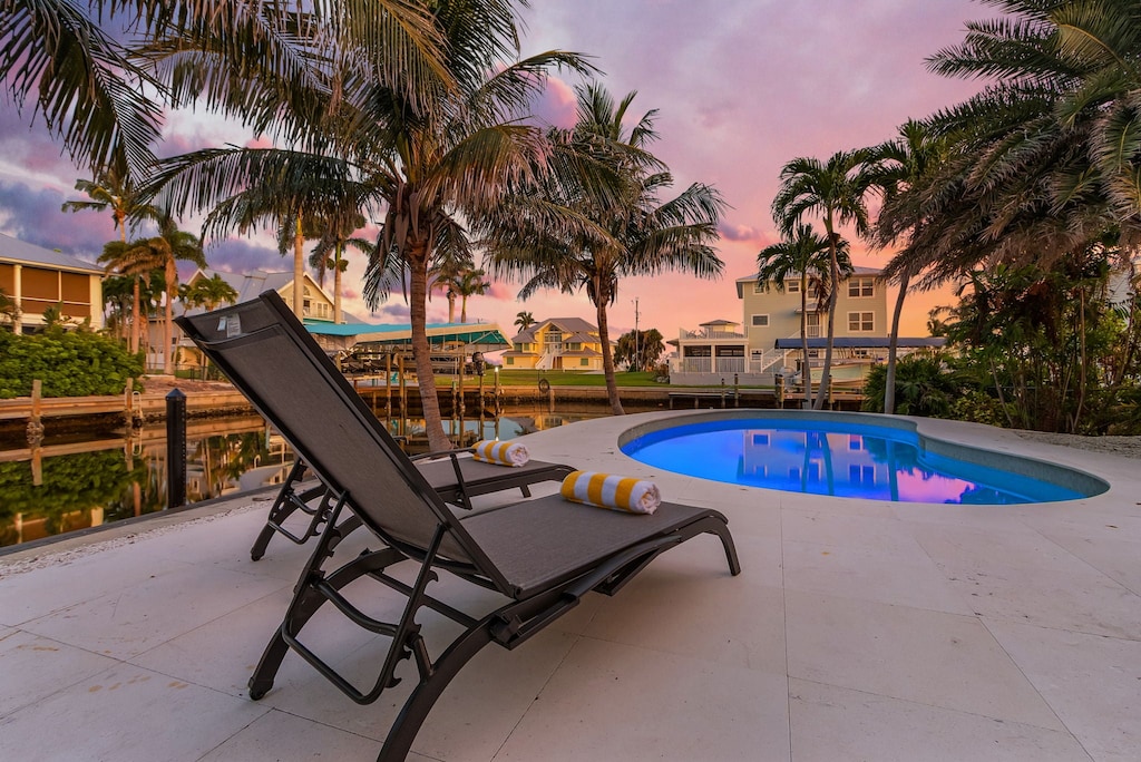 lounge chairs on the pool deck perfect for soaking up some sun.