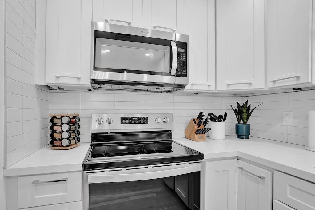 Fully stocked kitchen including spices and cooking utensils. The kitchen is ready for you to make your favorite meal!