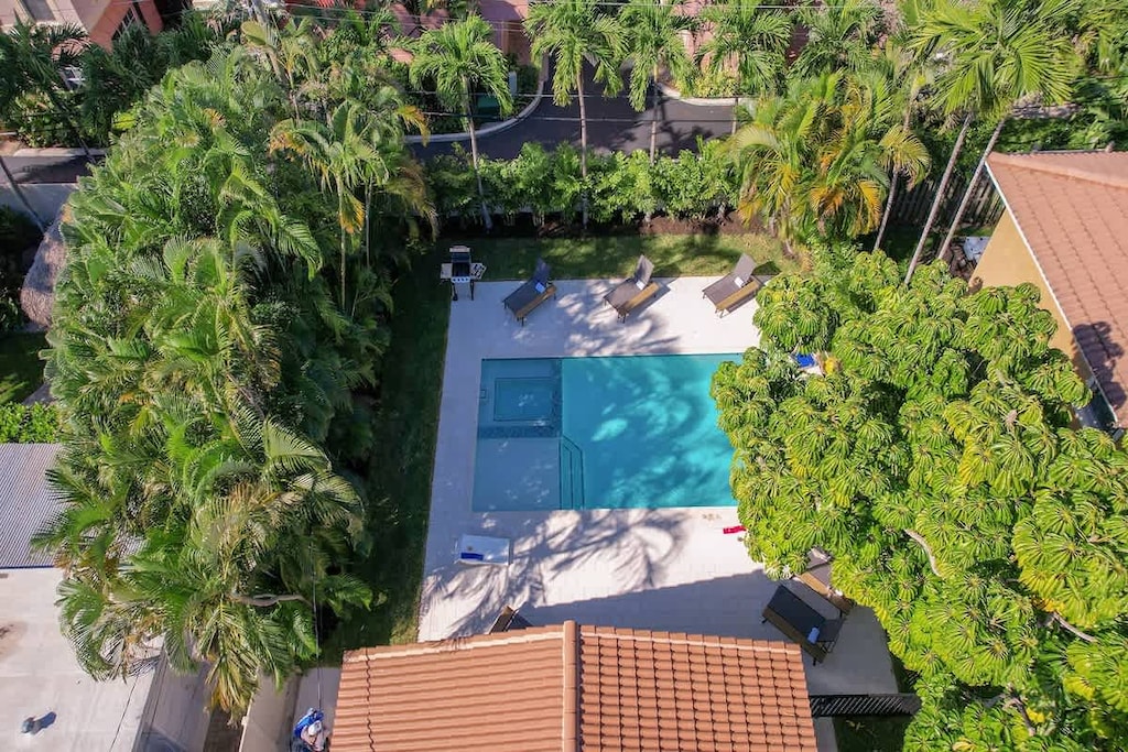 BRAND NEW report-style pool with tropical landscaping.  Perfect spot to enjoy a beautiful Florida day!