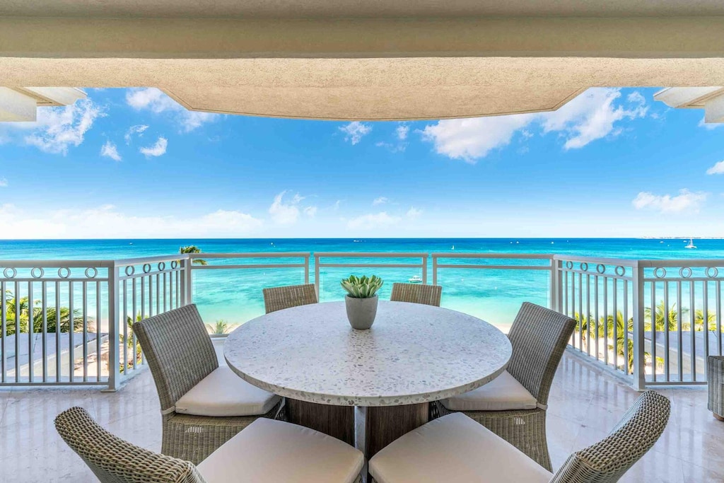 Savor alfresco meals with elevated seaside views from the condo's private balcony.