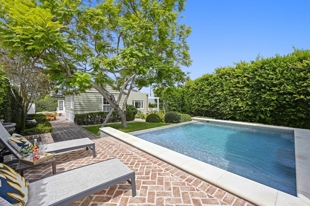 Plunge pool with sun lounges