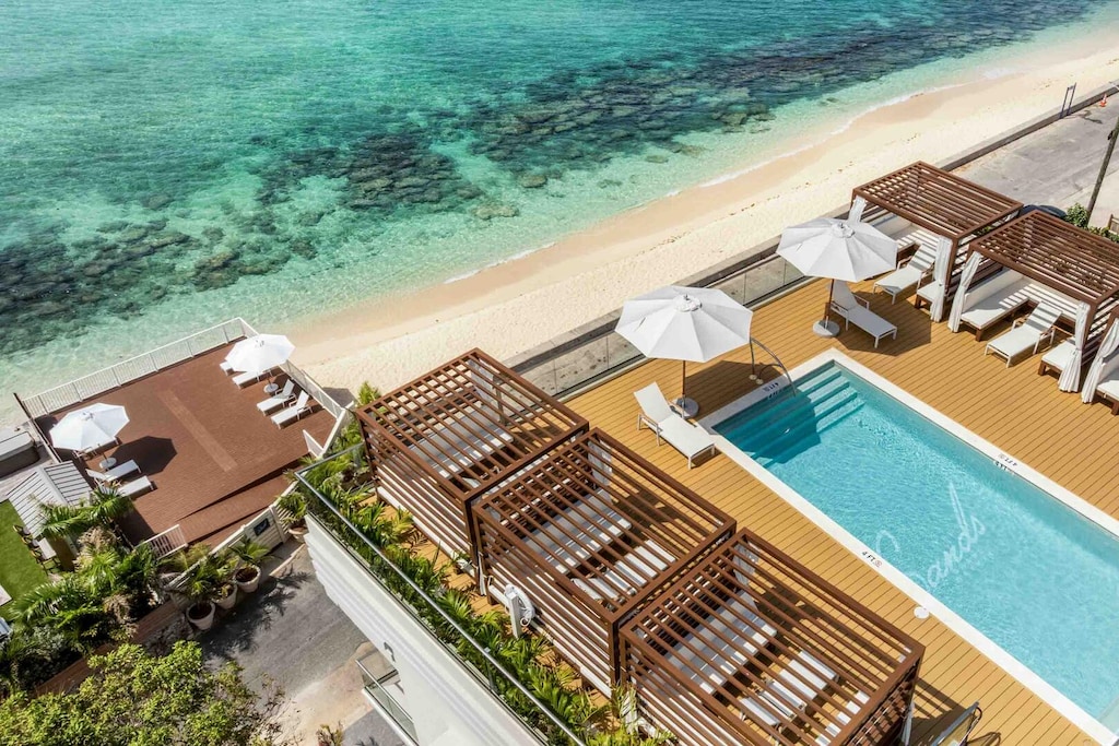 In addition to the rooftop pool, guests can also access the beach deck overlooking the ocean.