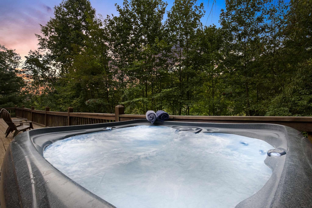 Ready to soak your worries away? This hot tub is calling your name, and the bubbly water is just right. Hot tub goals: achieved. All that's missing is you.
