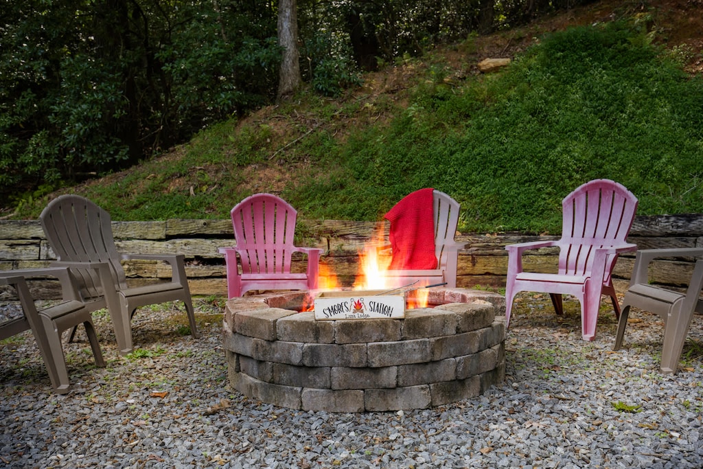 Gather 'round our crackling fire pit, perfect for sharing stories, roasting marshmallows, and soaking in the crisp air of the woods. Your unforgettable getaway starts here.