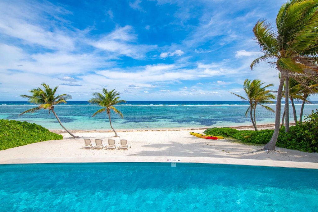 Private pool and backyard beach.