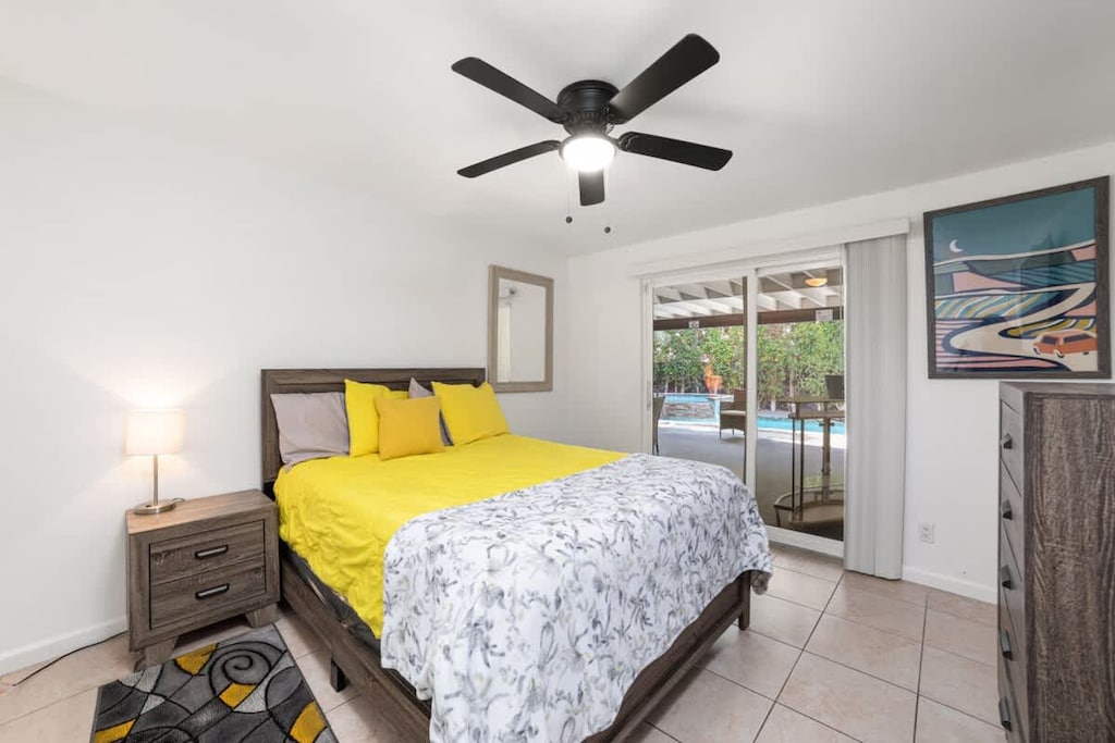 Bedroom 2: 1 Queen Bed with Access to Patio