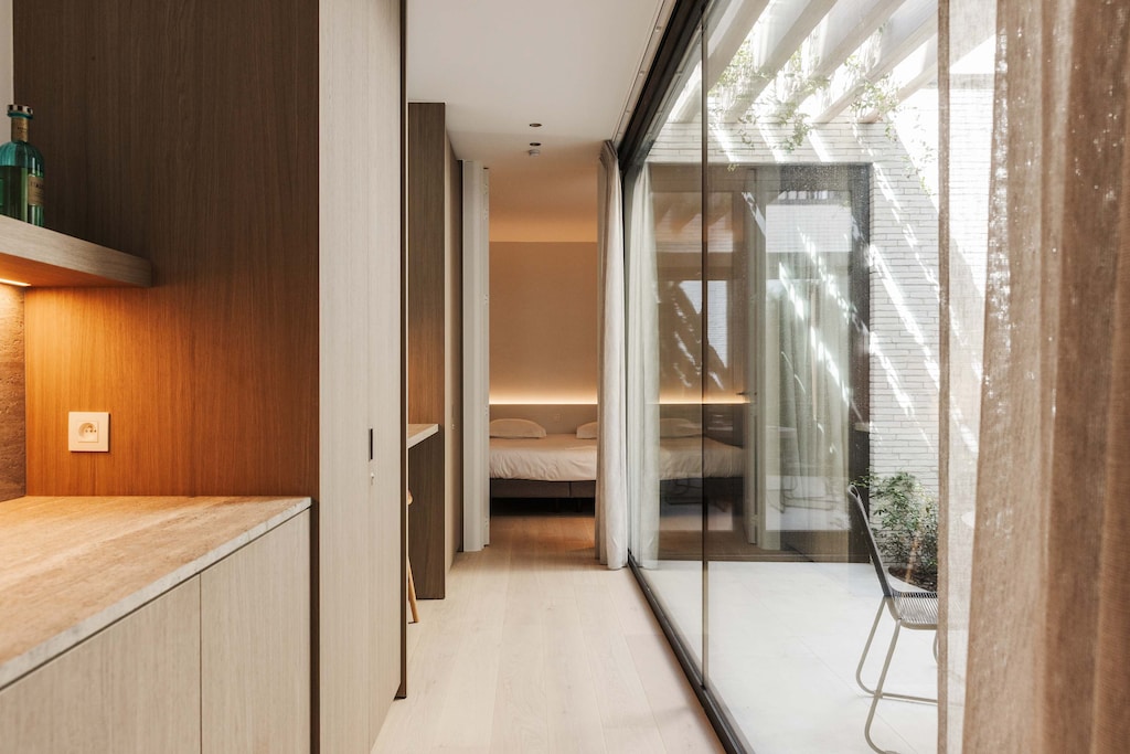 Bright hallway leading to bedroom and terrace