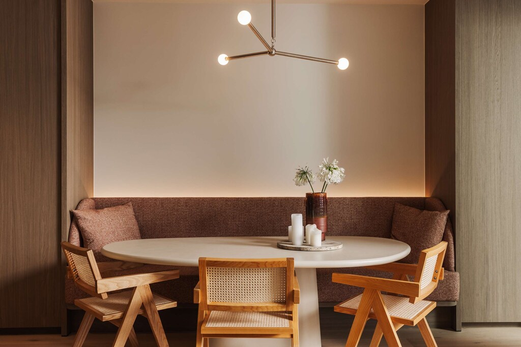 Cozy dining corner with soft bench seating