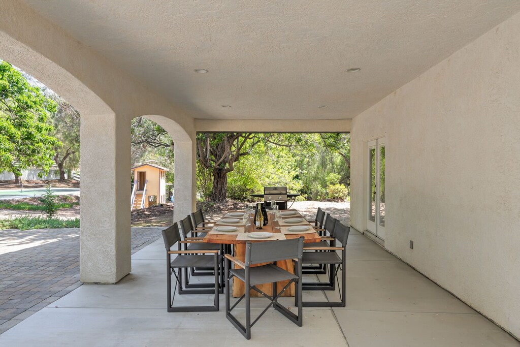 Additional outdoor dining with grill.