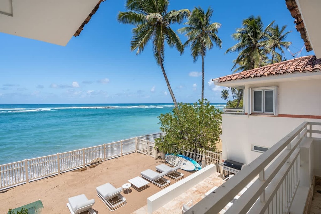 On the beach – multiple Chaise Lounges plus exterior night lighting