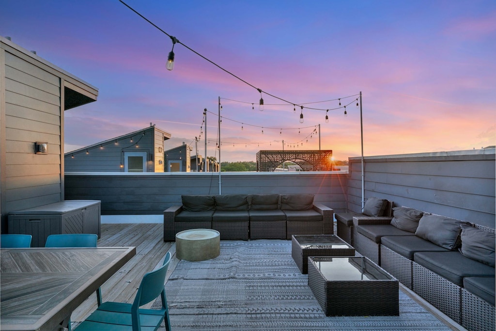 Experience Nashville from this stunning rooftop oasis with breathtaking skyline views! Ideal for large groups and bachelorette parties, this is one of Misfit Homes' top vacation rentals. Reserve your stay today!