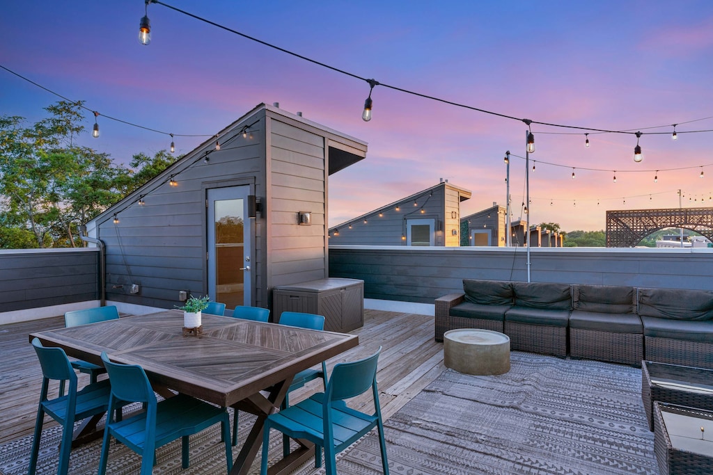 Discover your perfect escape at this rooftop oasis in the heart of Music City! Enjoy stunning skyline views, comfy seating, and twinkling lights for your next gathering. Book now with Misfit Homes for unforgettable Nashville vacation rentals!