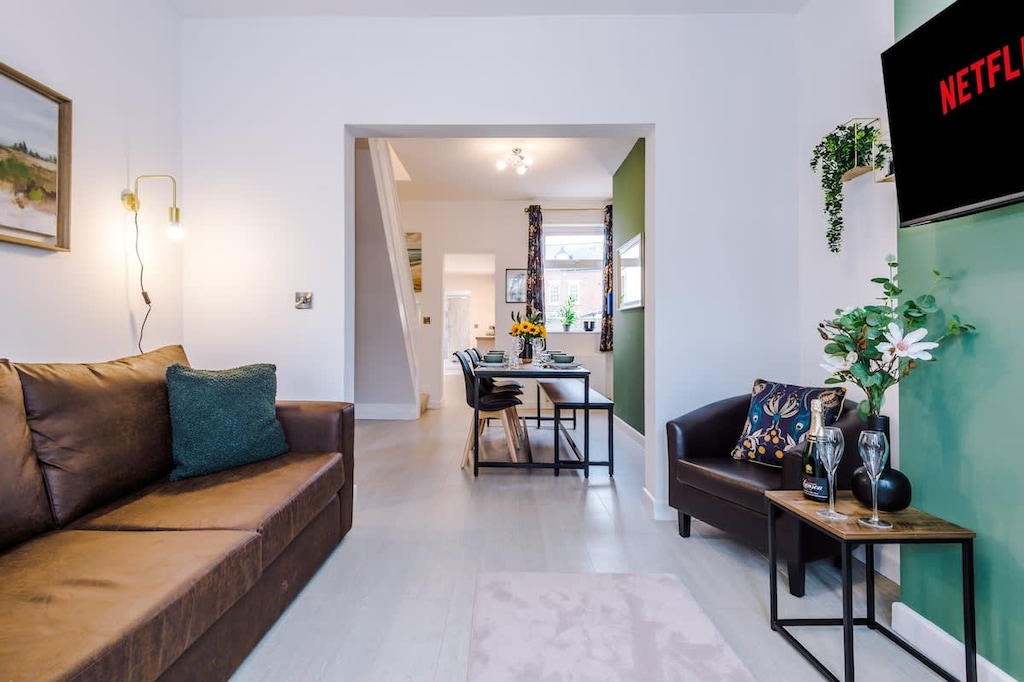 The living room benefits from a sofa bed and plenty of space to sit down and relax.