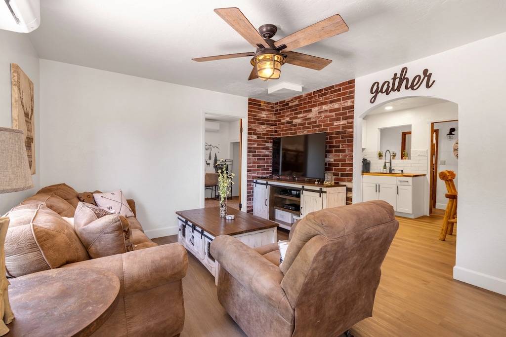 Plenty of seating for time spent together indoors. Enjoy the large screen tv, ceiling fan and time with family and friends.