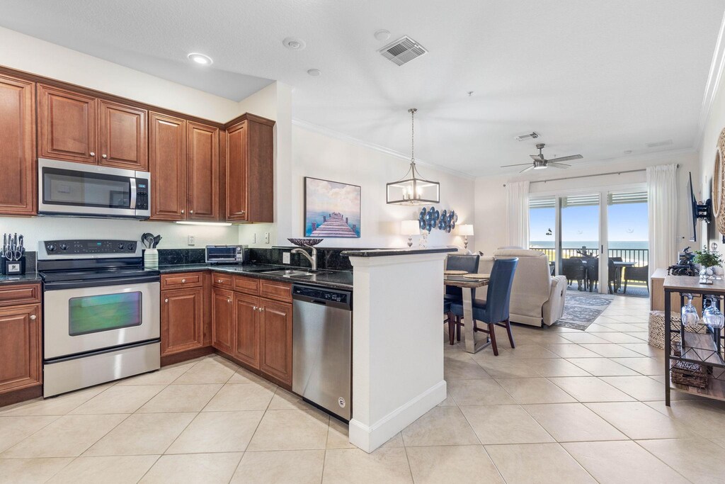 You will be welcomed by an open kitchen, dining and living space with incredible views!