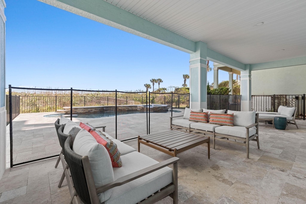 Covered Patio with plenty of seating to lounge.