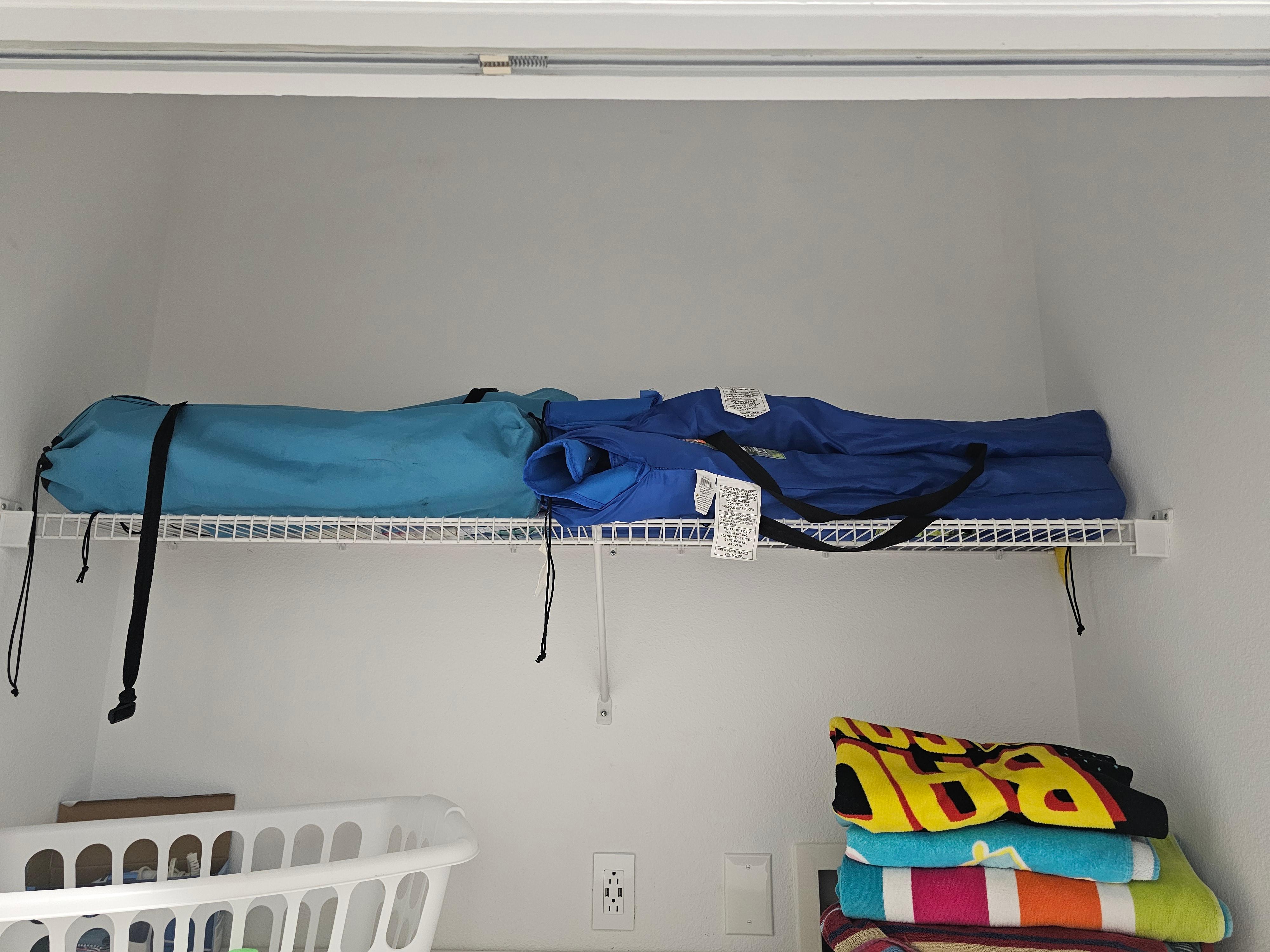 Chairs to take to the Beach are stored in the laundry room.