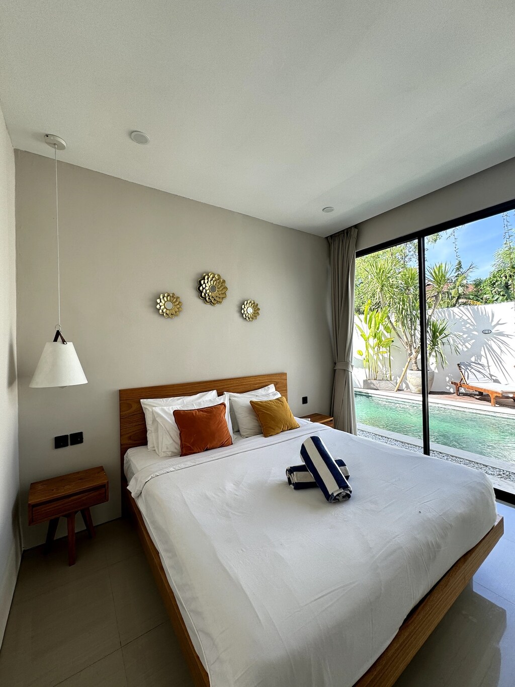 Experience elegance at Villa Kaba with our uniquely styled bed decor—a beautiful blend of comfort and artistry that creates a warm, inviting atmosphere for your stay. #Villa Kaba