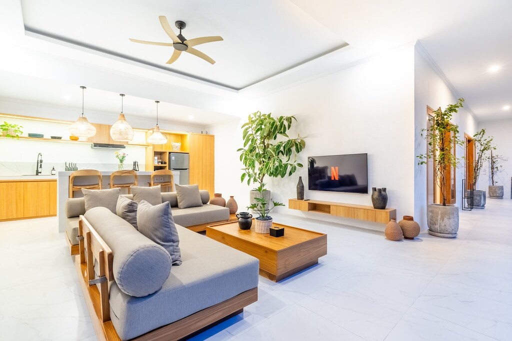 Unwind in the peaceful charm of Villa Tambora. The stylish, cozy living room is perfect for hanging out with friends or enjoying a Netflix night in. #Villa Tambora