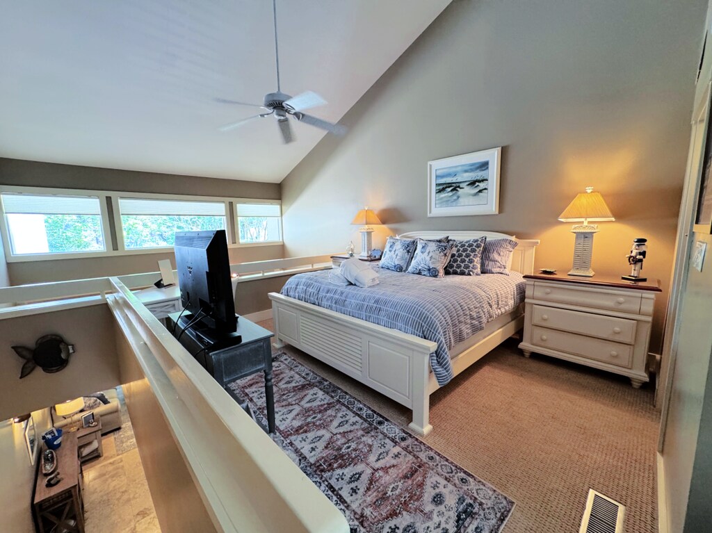 Primary bedroom with a king bed