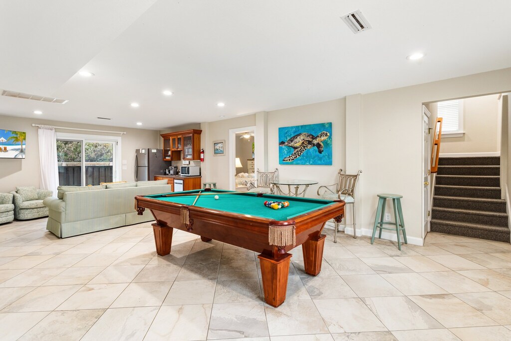 Make your way over to the game room, where you can let off some steam over a game of Billiards at the Pool Table.