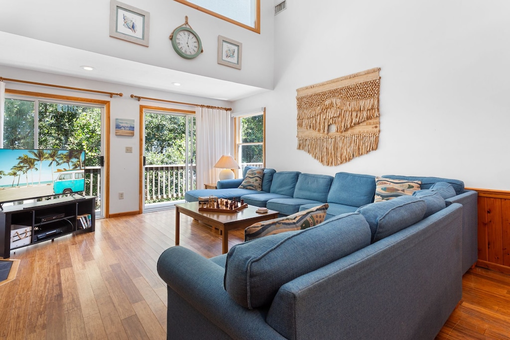 Relax in the open-air Living Area with Flat Screen TV for family movie night.