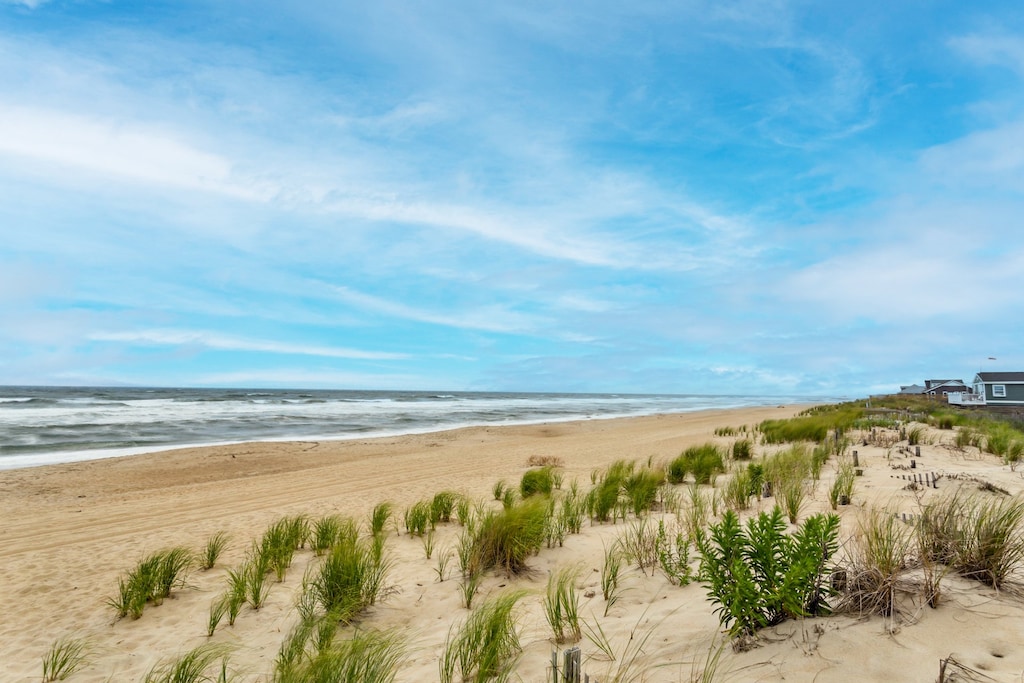 Step right out onto the sand at Alwright Alwright Alwright!